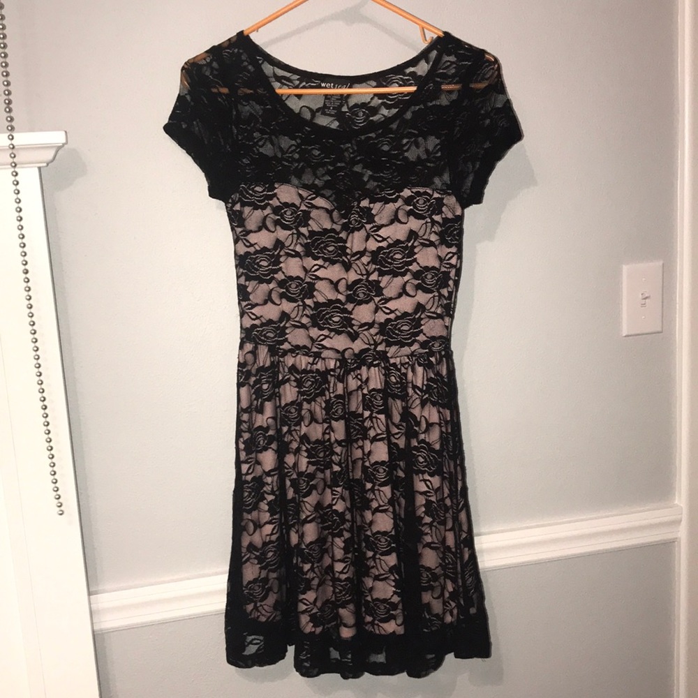 Black lace dress with light pink under layer